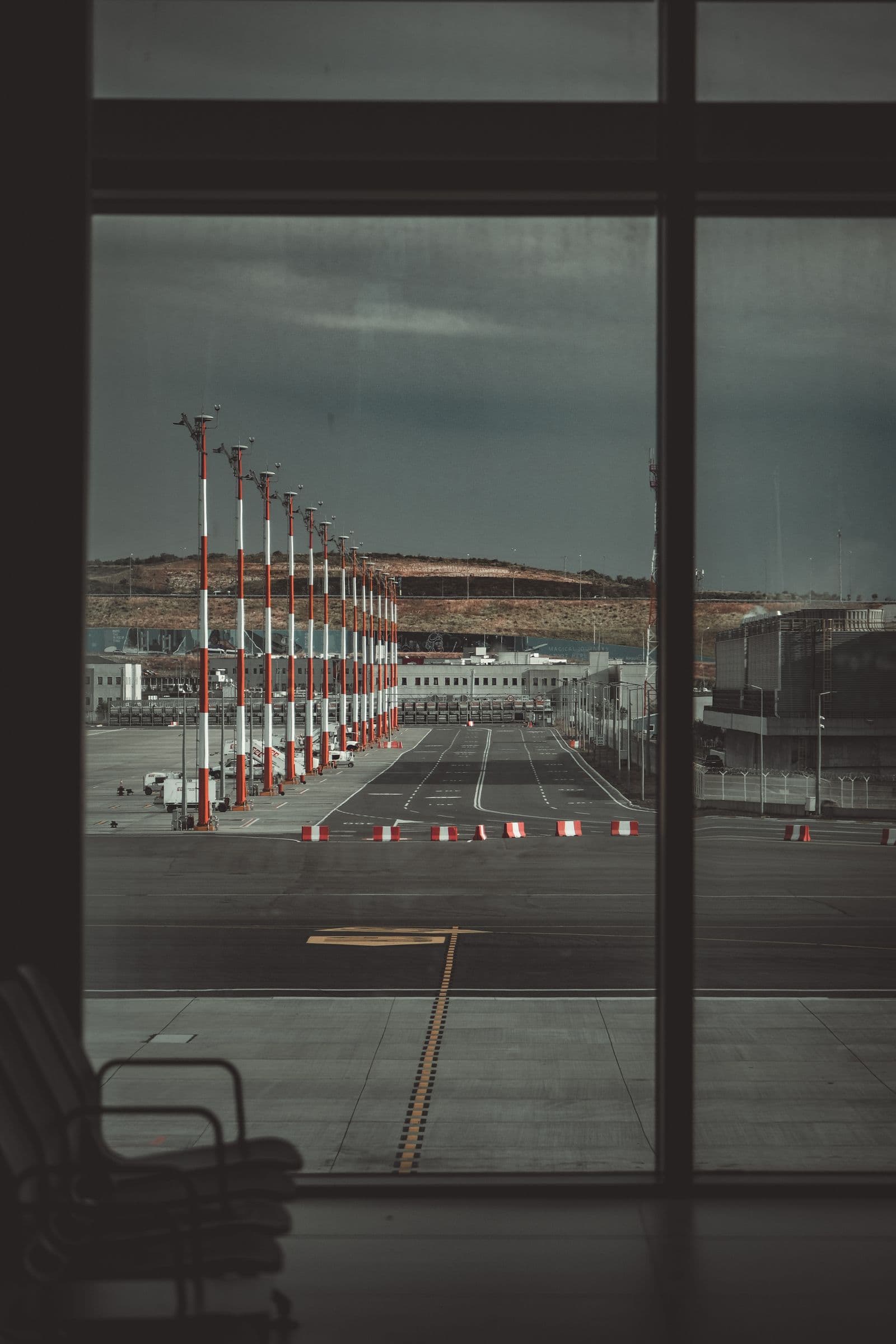 Quiet airport lounge looking out across the tarmac