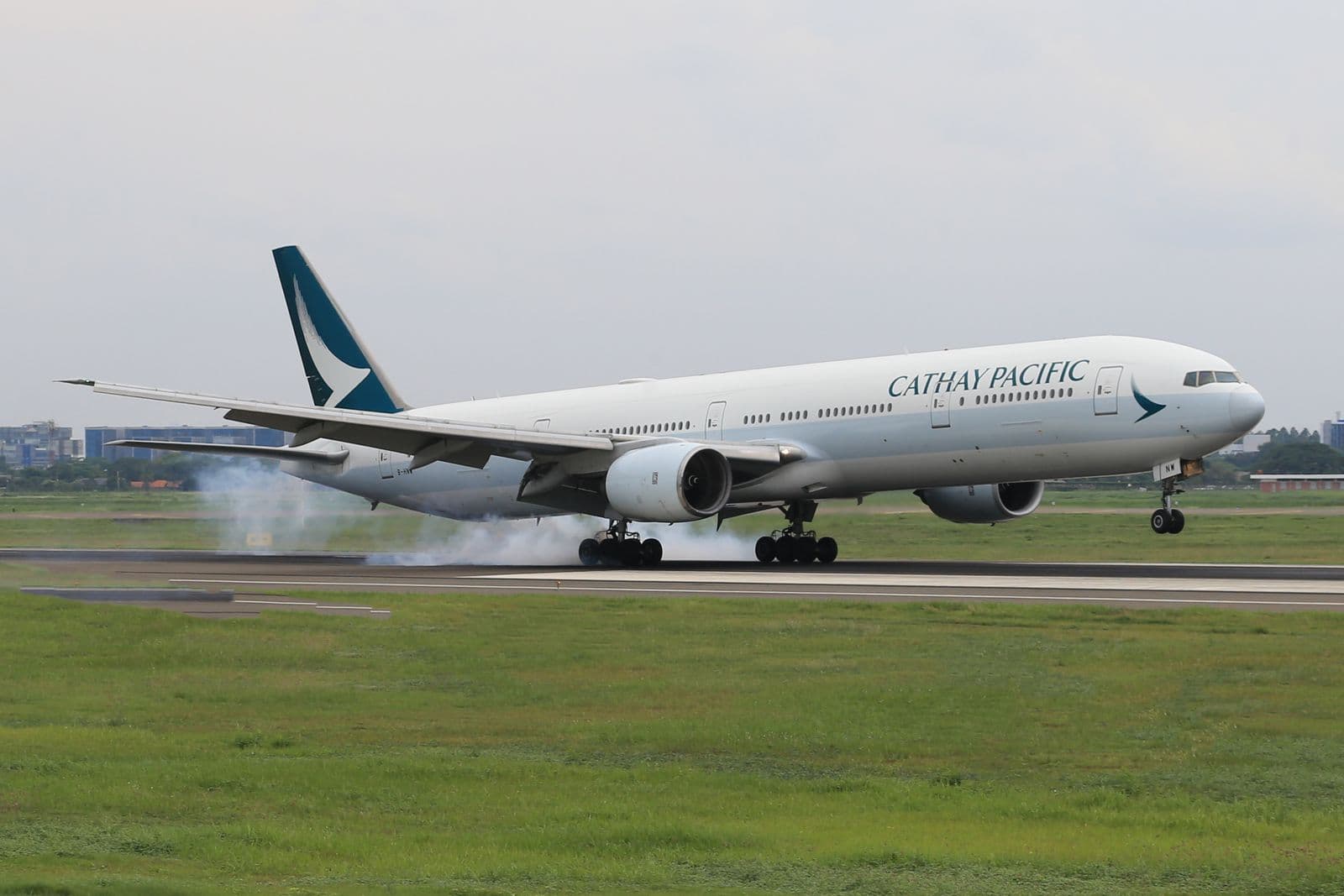 Commercial airplane taking off from a runway