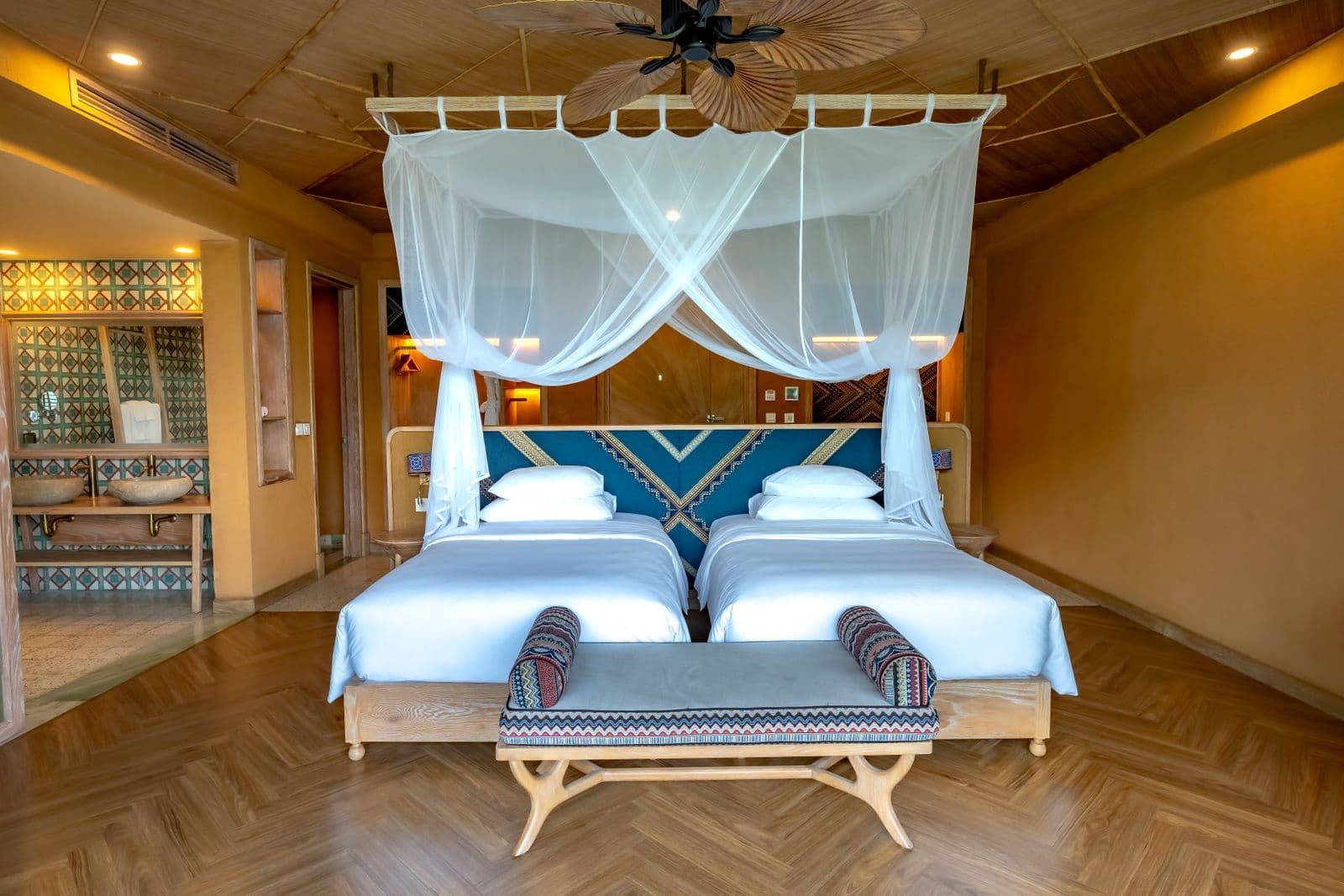Luxury hotel room with canopy beds