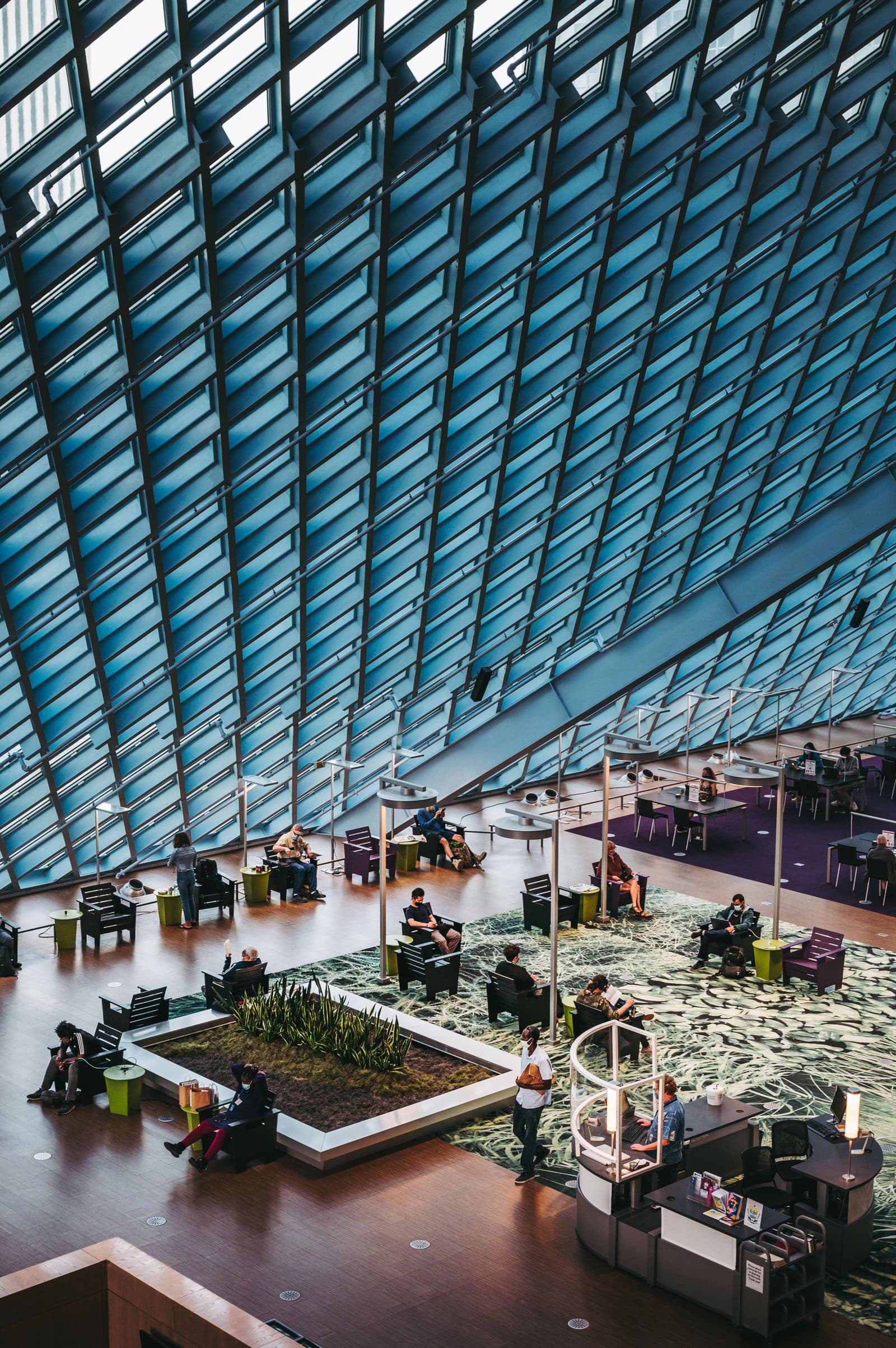 Spacious airport lounge with travelers waiting before departure