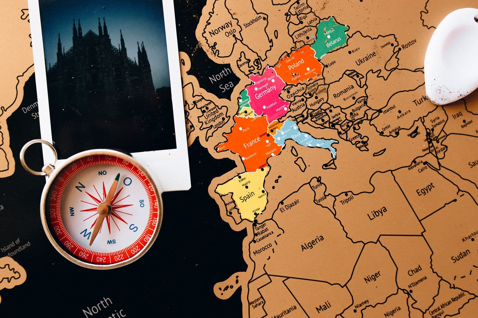 Travel map with a compass and passport
