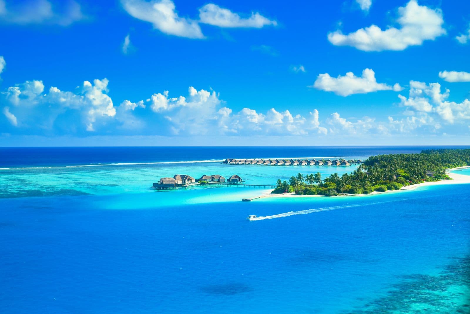 Overwater villas on a tropical Maldivian island